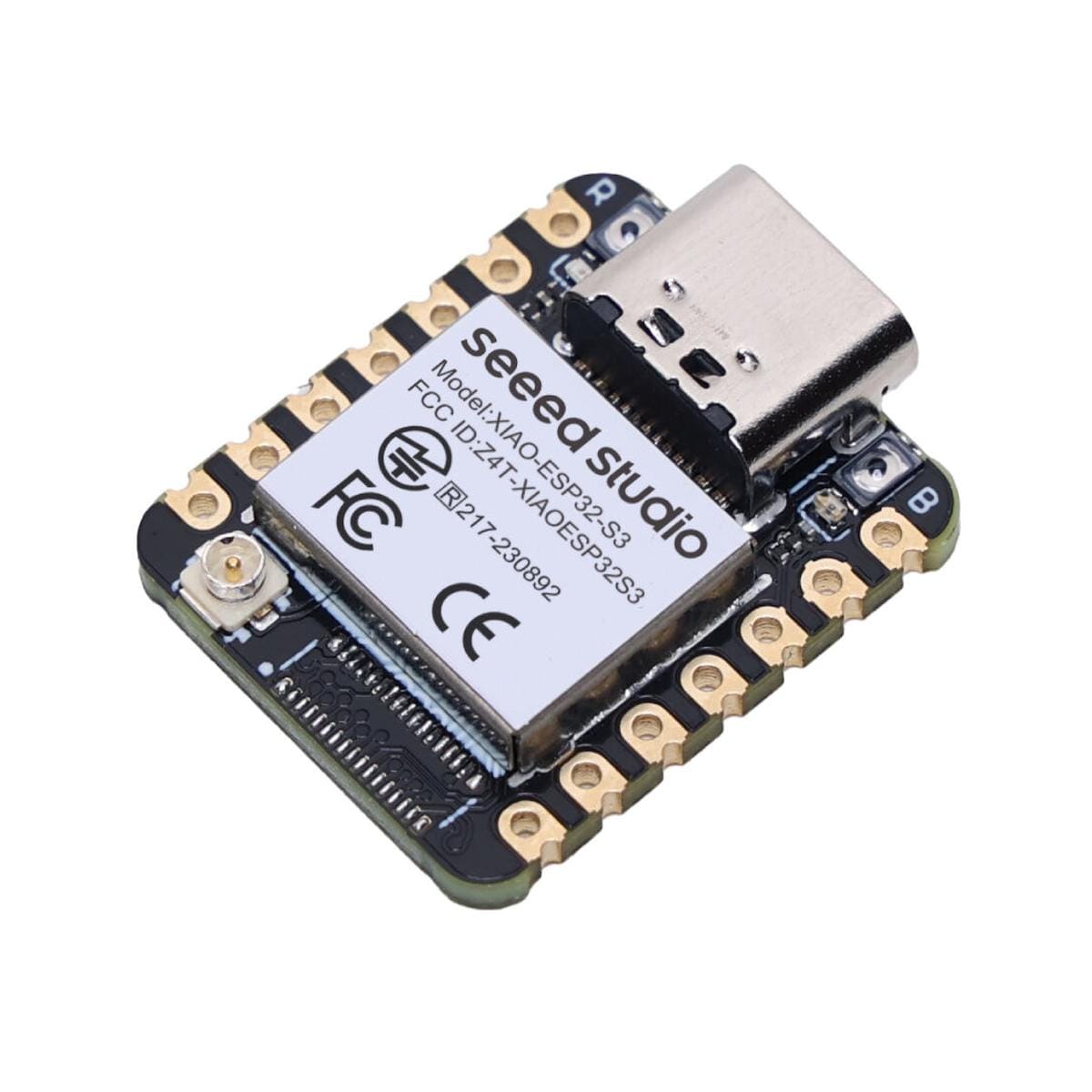 Seeed Studio XIAO ESP32-S3 fejlesztőpanel elölnézetben USB-C csatlakozóval, árnyékolt ESP32-S3 modullal, antennaaljzattal és kétoldali aranyozott csatlakozópadokkal.