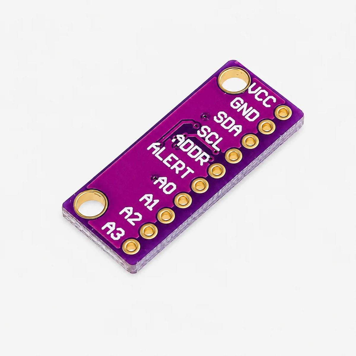 ADS1115 modul hátoldala ferde nézetben, VCC, GND, SDA, SCL, ADDR, ALERT és A0–A3 csatlakozásjelölésekkel, két nagy rögzítőfurattal.