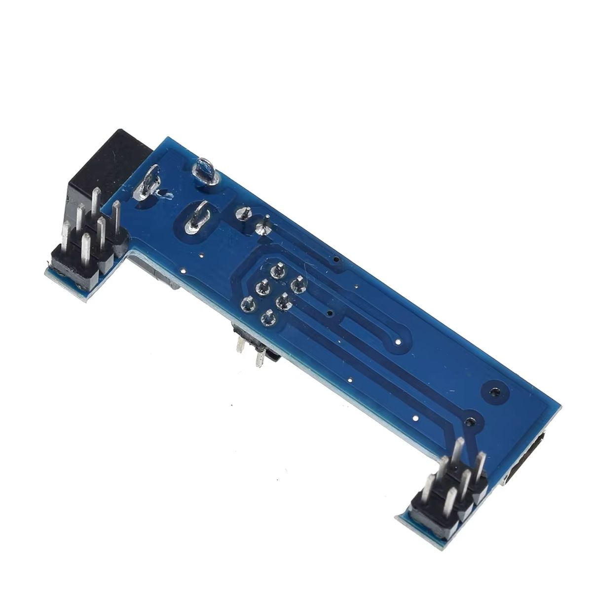 Kék breadboard tápegység modul miniUSB és DC bemenettel, kapcsolható 3,3 V vagy 5 V kimenettel elektronikai prototípus breadboardon építéséhez.