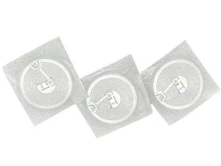 Átlátszó öntapadós MIFARE S50 RFID matrica 13.56 MHz frekvencián, 1 KB írható memóriával beléptető és NFC rendszerekhez.